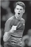  ?? KIRSTY WIGGLESWOR­TH, AP ?? Milos Raonic celebrates winning the first set against Dominic Thiem during their match at O2 Arena in London on Thursday.