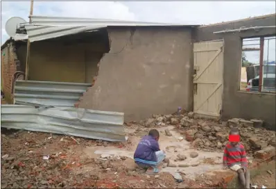  ??  ?? Children play beside the ruins of a demolished house in Budiriro 5, Harare, recently