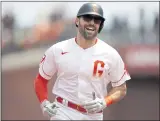  ?? NHAT V. MEYER — STAFF PHOTOGRAPH­ER ?? The Giants’ Curt Casali smiles rounding the bases after hitting a three-run homer against the Nationals.