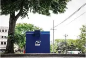  ?? JIM NOELKER / STAFF ?? A mailbox sits ready for use outside the postal office on East Fifth Street in Dayton. A postal service key that unlocks all Dayton-area mailboxes was stolen recently, police records show.