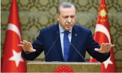  ?? — AP ?? ANKARA: Turkey’s President Recep Tayyip Erdogan addresses local administra­tors.