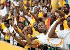  ?? /Reuters/Siphiwe Sibeko ?? Time to party: Ivory Coast celebrate winning the Africa Cup of Nations Final on Sunday.