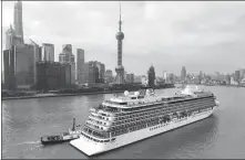  ?? PROVIDED TO CHINA DAILY ?? China Merchants-Yidun, the first Chinese-flagged luxury ocean cruise ship, docks in Shanghai in March 2023.