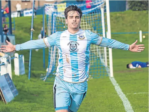  ??  ?? East Craigie striker Nik Mann celebrates his late winner against Rosyth in their Scottish Cup replay at Thomson Park.