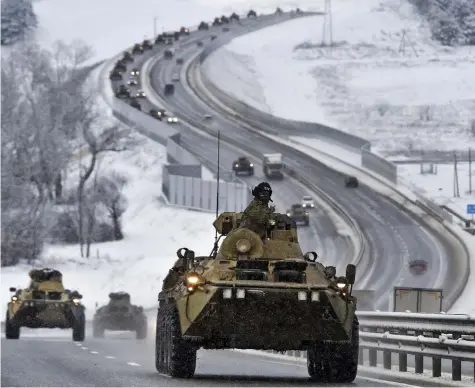  ?? ?? Show of strength: Russian armoured vehicles move through Crimea near the Ukraine border this week