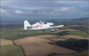  ??  ?? The aircraft flying just south of Taghmon last October. Picture by Peter Tawse of Wexford Flying Club.