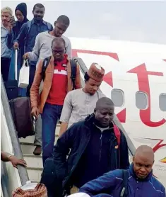  ??  ?? Passengers disembark on Ethiopian Airlines during its anugural flight at the Kaduna Internatio­nal Airport, Kaduna yesterday.