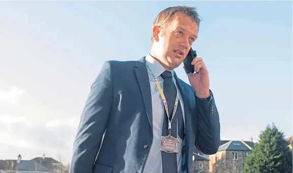  ?? Picture: SNS Group. ?? SFA chief executive Ian Maxwell on his way into Hampden for yesterday’s Uefa conference call that saw Euro 2020 being put back a year to give breathing space for domestic leagues to be completed after the coronaviru­s threat. See pages 46-47.