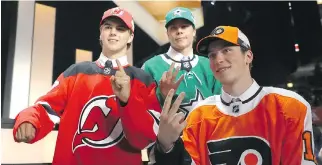  ?? BRUCE BENNETT/GETTY IMAGES ?? The top three picks in Friday’s NHL entry draft, Nico Hischier, Miro Heiskanen and Nolan Patrick, left to right, pose for a photo after being selected on Friday in Chicago.