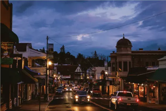  ?? Photos Max Whittaker / Special to The Chronicle ?? Highway 49 passes through downtown Sonora. The city became a focal point for COVID divisions in Tuolumne County.