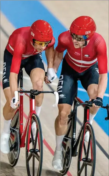  ?? FOTO: TARIQ MIKKEL KHAN ?? Lasse Norman Hansen (til højre) og Michael Mørkøv vandt OL-guld i parløb i Tokyo.