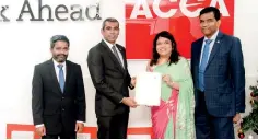  ?? ?? Ms. Nilusha Ranasinghe Head of South Asia ACCA exchanging the MOU with CA Maldives President /Auditor General Mr. Hussain Niyazy. Also in the picture is the Chairman Member Network panel ACCA Sri Lanka Mr. Nandika Budhipala and Vice-President of CA Maldives, Mr. Hasan Mohomed