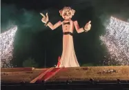  ?? EDDIE MOORE/JOURNAL ?? Zozobra, along with 113,013 glooms placed inside, goes up in flames at Fort Marcy Park in Santa Fe on Sept. 4.