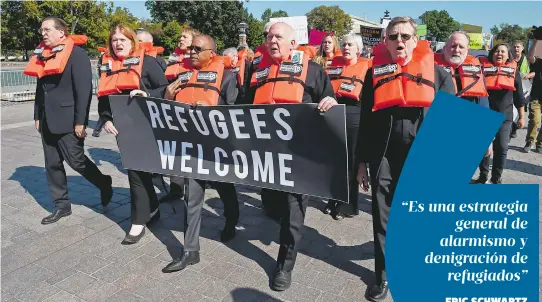  ?? AFP ?? Activistas realizan una protesta de desobedien­cia civil contra la "aniquilaci­ón" del programa de reasentami­ento de refugiados de EU, en Washington, en octubre de 2019/
ERIC SCHWARTZ