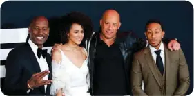  ?? (Reuters) ?? ACTORS Tyrese Gibson, Nathalie Emmanuell, Vin Diesel and Ludacris attend ‘The Fate Of The Furious’ New York premiere at Radio City Music Hall in New York, U.S. April 8, 2017.