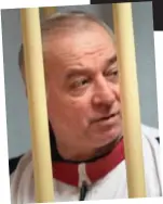  ??  ?? Critical: Skripal, above left during his trial in Moscow in 2006, lived in a semi-detached house, centre, which daughter Yulia often visited