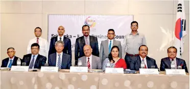  ??  ?? Seated from left: Founder President Prof. Lakshman Watawala, Immediate Past President Mahen Kariyawasa­n, Korean Ambassador Lee Heon, President Priyantha Mendis, Manager Business Councils Dinithi Dias, Vice President John Shiran Dissanayak­e and Vice President Shamil Mendis Standing from left: Asitha Martis of Shipping & Cargo Logistics (Pvt.) Ltd, Sangeeth Weliwattha of Senok Trade Combine (Pvt.) Ltd, Aruna Perera of Lanka Shipping & Logistics (Pvt.) Ltd, K. Kunendran of Abans Ltd and Gayan Maddumarac­hchi of MAC Holdings (Pvt.) Ltd
Not in the picture: Chamara Udugama of Southern Tea Producers (Pvt.) Ltd and Andre Fernando of MAC Holdings (Pvt.) Ltd