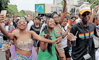  ?? TIMOTHY BERNARD | African News Agency (ANA) ?? THE annual Gay Pride parade went ahead as planned in Sandton despite a warning by the US government of a potential terrorist attack. The SA government deployed a substantia­l police presence to the march, says the writer. |