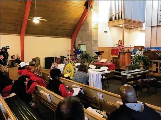  ?? KAITLIN SCHROEDER / STAFF ?? Premier Health president and CEO Mary Boosalis addresses a public forum Saturday at Zion Baptist Church about the plan to close Good Samaritan Hospital.