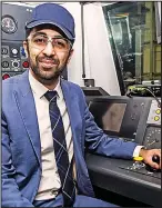  ??  ?? Hot seat: Mr Yousaf takes a train