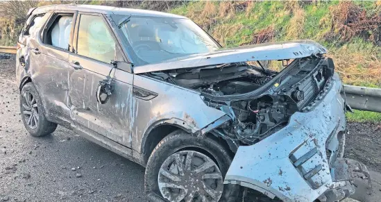  ??  ?? Fred MacAulay’s wrecked Land Rover Discovery at the scene of the crash.