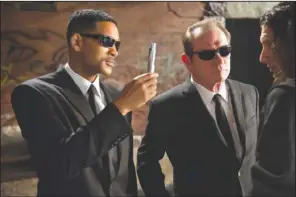  ??  ?? THEY’RE BACK: In this film image released by Sony, Will Smith, left, and Tommy Lee Jones are shown in a scene from “Men in Black 3.”