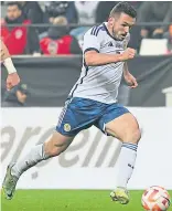  ?? ?? John Mcginn prepares to pull the trigger for his 15th Scotland goal