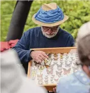  ?? File photo / H John Voorhees III/Hearst Connecticu­t Media ?? Lepidopter­ist Victor DeMasi shows examples of butterflie­s that can be found in the Ridgefield area on Sept. 30, 2017.