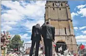  ??  ?? People pay tribute to French priest Father Jacques Hamel outside a church in SaintEtien­neduRouvra­y on Thursday.