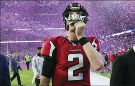  ?? CURTIS COMPTON — ATLANTA JOURNAL-CONSTITUTI­ON VIA AP, FILE ?? Falcons QB Matt Ryan reacts after losing Super Bowl 51 as confetti flies in Houston. Seven of the 12 playoff teams have never won the big game, matching the largest group of playoff-bound squads with not-so-Super pedigrees since the 1999 season.