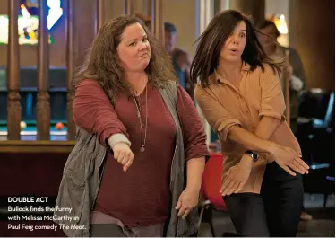 ??  ?? double actBullock finds the funny with Melissa McCarthy in Paul Feig comedy The Heat.