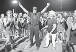  ??  ?? Former Mountain View coach Jesse Parker poses after cutting the ribbon in honor of the school naming its field after Parker on Friday.