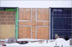  ?? NEWS PHOTO COLLIN GALLANT ?? A mural that is to be the Aurora Cannabis logo sits unfinished Friday at the company’s $200-million Aurora Sun greenhouse constructi­on project in Medicine Hat.