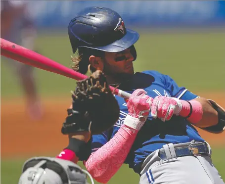  ?? USA TODAY SPORTS ?? Jays' Bo Bichette reacts to a pitch from Cleveland Guardians' Konnor Pilkington during MLB action at Progressiv­e Field on Sunday.