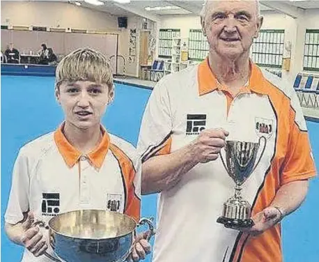  ?? ?? Ollie Jeapes (left) and Martyn Dolby with their EBF national indoor singles trophies.