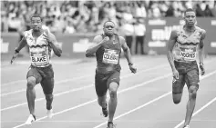  ??  ?? (L-R) Jamaica’s Yohan Blake, US athlete Christian Coleman and Britain’s Zharnel Hughes compete in the men’s 100m final during the 2018 IAAF Birmingham Diamond League athletics meeting at Alexander Stadium in Birmingham on August 18, 2018. - AFP photo