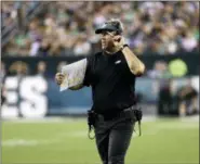  ?? MICHAEL PEREZ — THE ASSOCIATED PRESS ?? Eagles’ head coach Doug Pederson paces the sideline during last Thursday’s game against the Falcons. Pederson named Super Bowl LII MVP Nick Foles his starting QB for Sunday’s game against Tampa Bay.