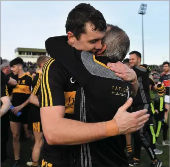  ??  ?? Michael Moloney of Dr Crokes celebrates with manager Pat O’Shea after the County SFC final between Dr Crokes and Dingle at Austin Stack Park Photo by Sportsfile