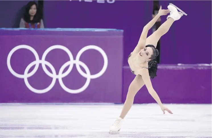  ?? PAUL CHIASSON/THE CANADIAN PRESS ?? Kaetlyn Osmond of Newfoundla­nd, who trains in Edmonton, completed her long program just eight points out of first place, capturing bronze Friday.