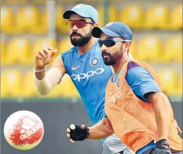  ?? AFP ?? India captain Virat Kohli (left) plays football with Ajinkya Rahane during a practice session in Dambulla on Friday.