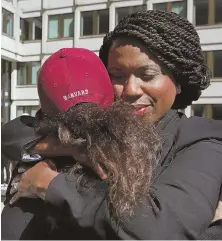  ?? STAFF PHOTO BY ANGELA ROWLINGS ?? ‘I BELIEVE YOU’: Boston City Councilor and Democratic nominee for Congress Ayanna Pressley embraces a demonstrat­or during a rally yesterday.