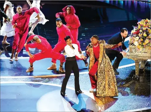  ?? AFP ?? US singer-songwriter Janelle Monae (left) and US actor Billy Porter perform onstage during the 92nd Oscars at the Dolby Theatre in Hollywood, California on Sunday.