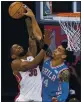  ?? CHRIS SZAGOLA — AP ?? The 76ers’ Danny Green, right, blocks a shot by the Miami Heat’s Chris Silva in Philadelph­ia.