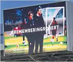  ?? ?? Robert Rowan pictured on Brentford’s electronic scoreboard with Thomas Frank following his untimely death