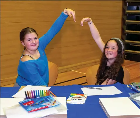  ??  ?? Leia Carroll and Matilda Shortt having fun at the children’s art workshop at the Mermaid.