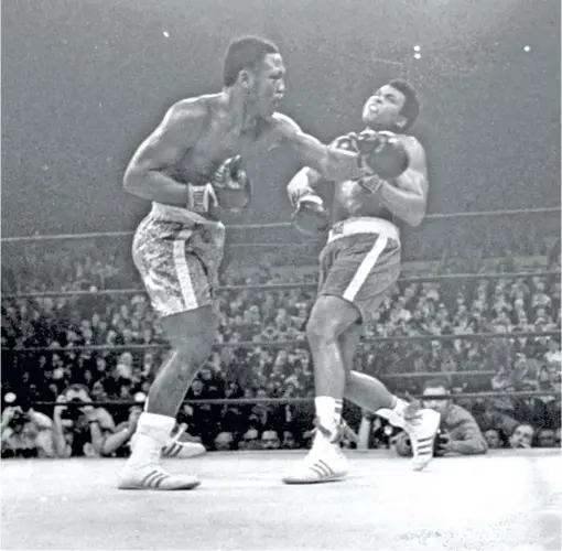  ?? AP ?? On March 8, 1971, Joe Frazier retained the heavyweigh­t title in a 15-round decision over Muhammad Ali in front of 20,455 at Madison Square Garden.