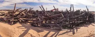  ?? ROBERTO E. ROSALES/ JOURNAL ?? BOTTOM: Steel is gathered in heaps at the constructi­on site.