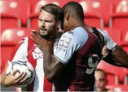  ?? ?? STOKe 2 aSTON Villa 0 Villa striker Wesley headbutts Nick Powell and is given a red card in their defeat at Stoke