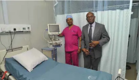  ??  ?? Consultant Cardio Thoracic Surgeon, Royal Victoria Hospital, Ireland, Dr Onyekwelu Nzewi (l), and Professor of Medical Imaging, Northweste­rn University, Illinois, United States, Dr.Kofo Ogunyankin, during the media tour of First Cardiology Consultant­s...