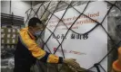  ?? Photograph: AP ?? A worker in China’s Guangdong province in March prepares a shipment of coronaviru­s-related health supplies from the Jack Ma Foundation bound for Africa.